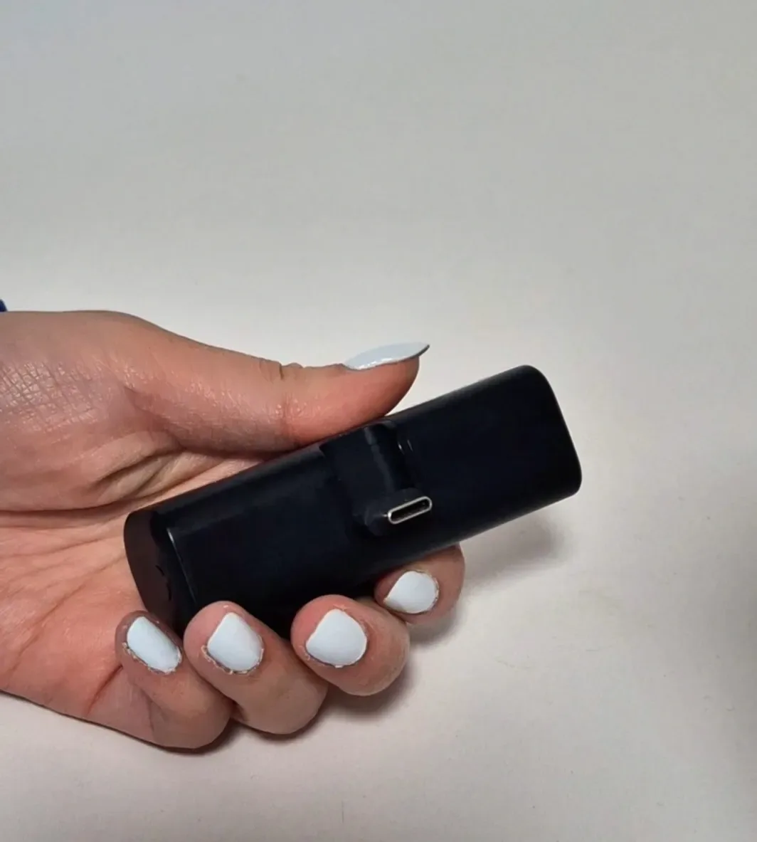 Anker Nano plugged into a smartphone during a real-world top-up