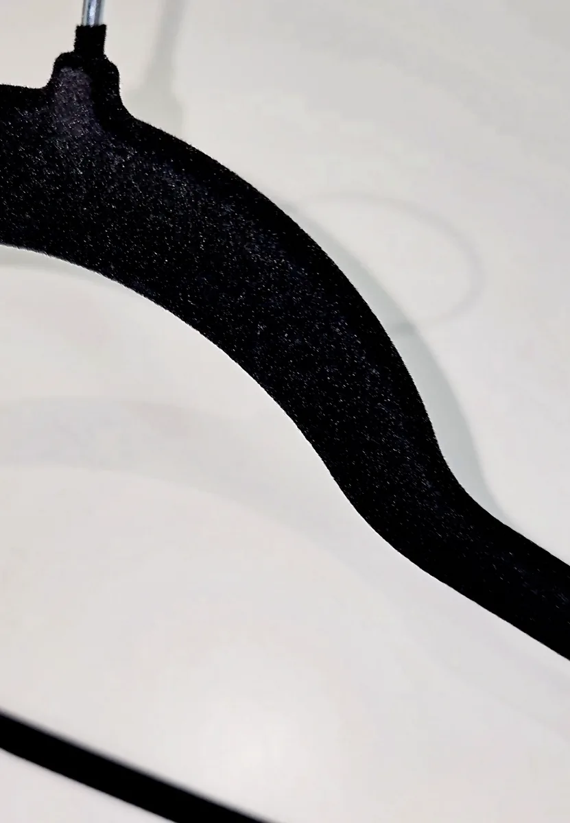 Velvet hanger close-up showing texture and hook detail